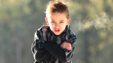 boy in black and white plaid coat, bad behavior